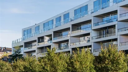 Lys og moderne lejlighed i ikoniske 8-tallet